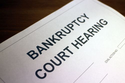 Someone fllling out Bankruptcy Court Hearing Form. - Dave Burns Law Office, LLC